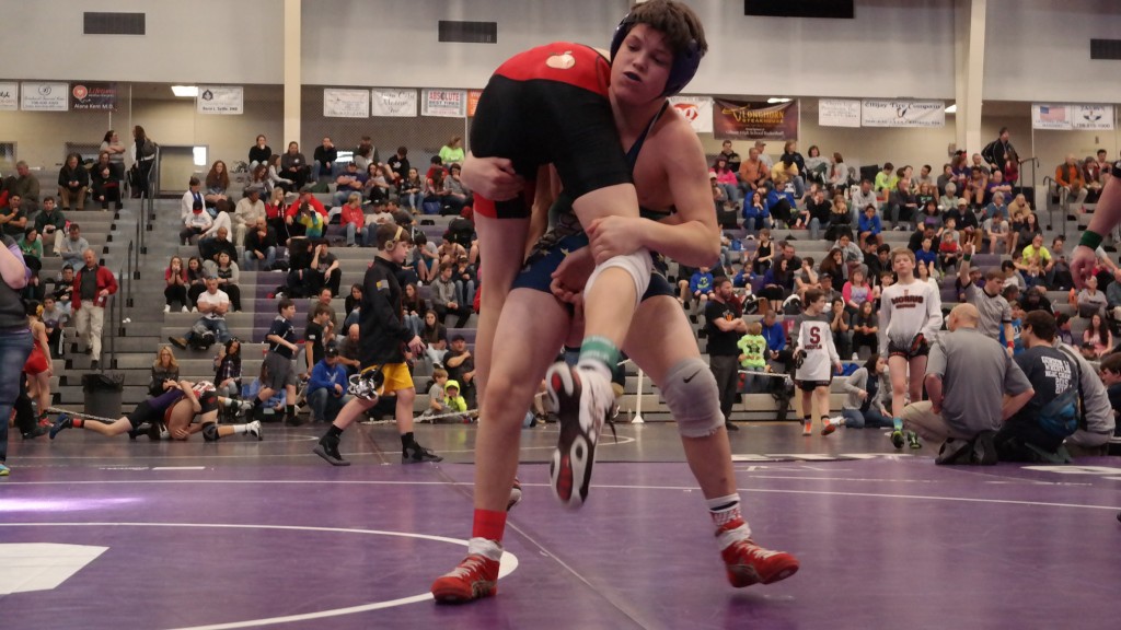 14U Bobcat Caleb Waddell prepares to slam his opponent to the mat last Saturday, during one of five 2015-16 Georgia Little/Big Kid's State Qualifiers, which was held at Gilmer High School. Waddell will join 27 other Bobcats at the state tournament Saturday in Perry. (Photo by: Kevin Hensley)
