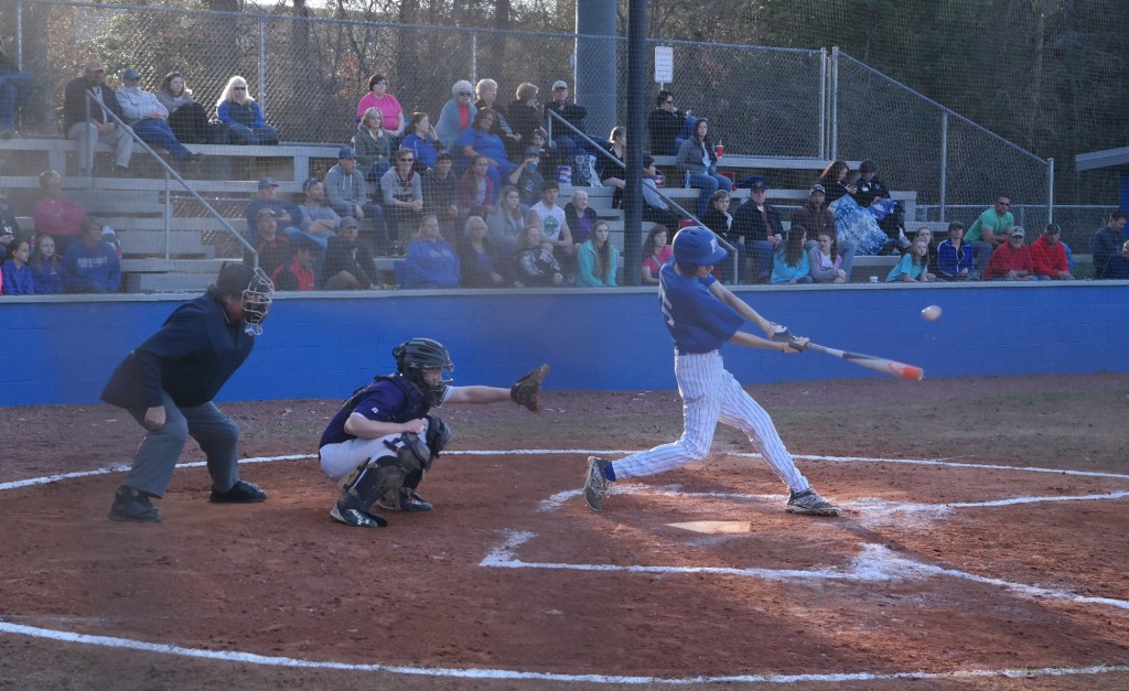 JV Rebel Matthew Shirah puts the ball in play during game one of a doubleheader against Gilmer yesterday. Shirah had two RBIs in the second game, but Fannin dropped both five-inning games, 6-2 and 10-8. (Photo by: Kevin Hensley)