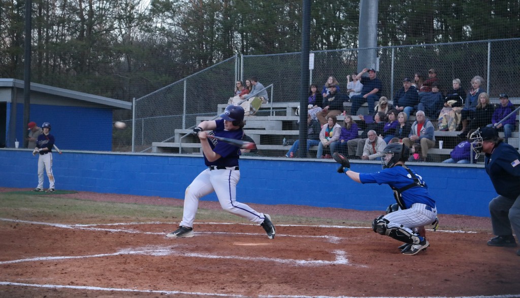 JV Bobcat Tyler Woody is moments away from making a connection yesterday at Fannin. Against the Rebels, Woody tallied five RBIs to lend a hand in Gilmer winning both games of a doubleheader, 6-2 and 10-8. (Photo by: Kevin Hensley)