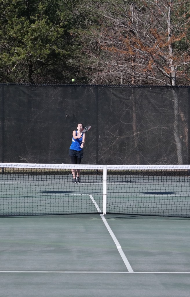 Lady Rebel Emily Key delivers the ball yesterday against Gilmer. Key secured the only Fannin win of the day against GHS, downing Ally Davis 6-0, 6-4. (Photo by: Kevin Hensley)