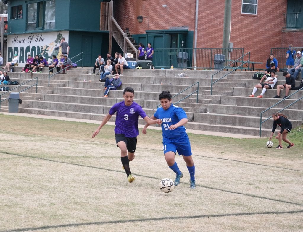 Rebel Brandon Carranza fights off a Gilmer charge last Saturday at the 2016 North Georgia Soccer Classic at Jasper Middle School. Carranza scored three of the 10 goals against the Towns County Indians last Monday. (Photo by: Kevin Hensley)
