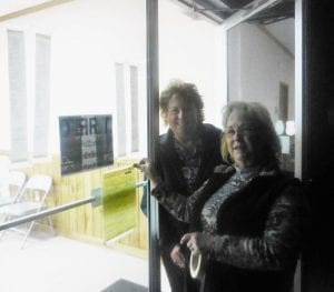 Morganton poll workers Sandy Deems and Joyce Miller post Morganton's Super Tuesday results.