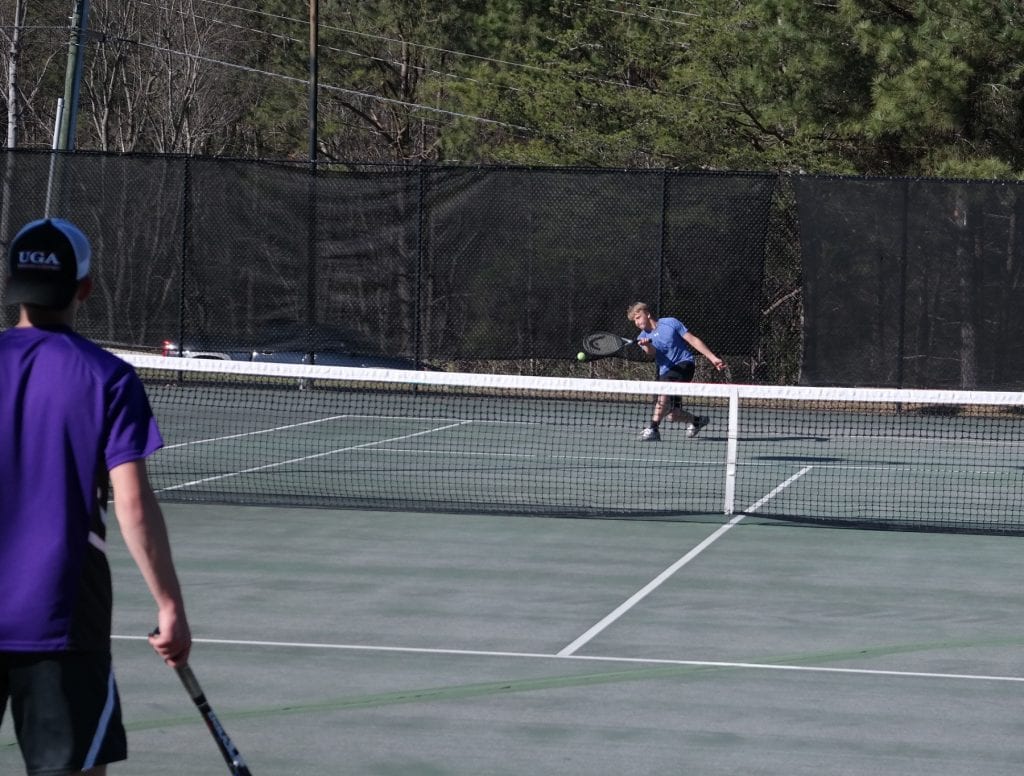 Fannin Rebel Blake Cobb returns a shot during a match at Gilmer County March 22. Cobb garnered the only Rebels victory last week, a 4-6, 6-3, 6-4 singles victory over Banks County. (Photo by: Kevin Hensley)
