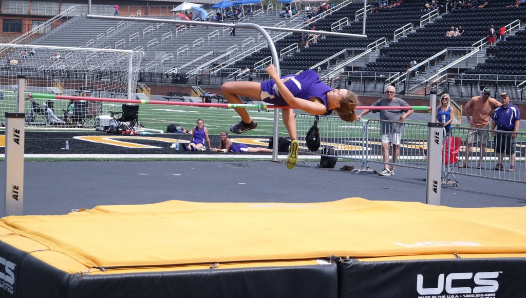 Lady Cat senior Lauren Bentley clears 5' 2" on the high jump, to win the girls sectionals at Carrollton High School last Saturday. (Photo by: Kevin Hensley)