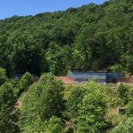 A view from Cedar Tree Villa across the open-air play area across to another villa.