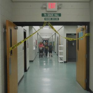 The seventh-grade hall was cordoned off as a crime scene.