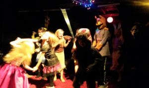 Monsters mashing on stage to the tune of Monster Mash