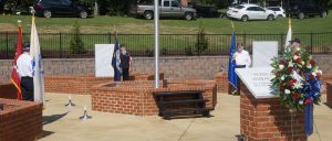 The Honor Guard presents the military branch flags beginning the ceremony of dedication for Veterans Memorial Park.